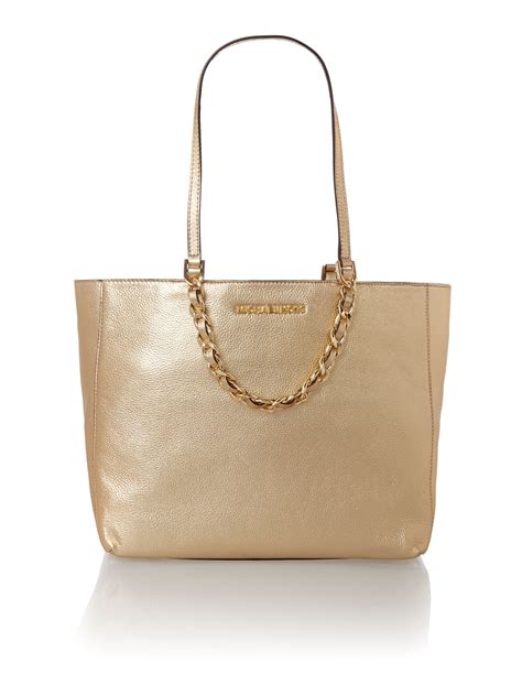 gold and diamonds michael kors bag|Michael Kors gold evening bag.